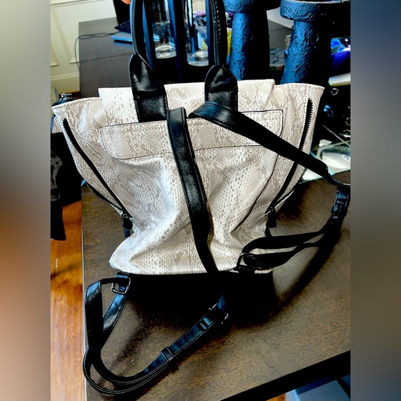 Perfect condition backpack purse. Purchased and used a few times. Mint condition - Picture 2 of 3